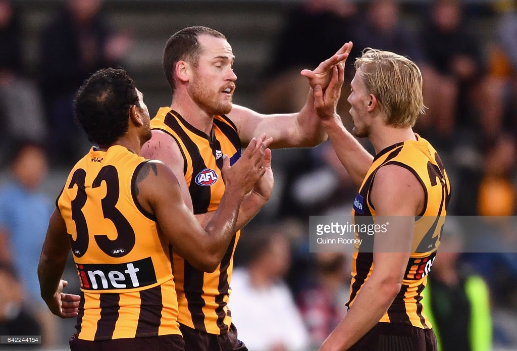 jarryd-roughead-of-the-hawks-is-congratulated-by-team-mates-after-a-picture-id642244154