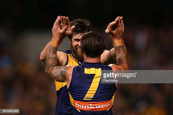 josh-kennedy-of-the-eagles-celebrates-a-goal-with-chris-masten-during-picture-id591942360
