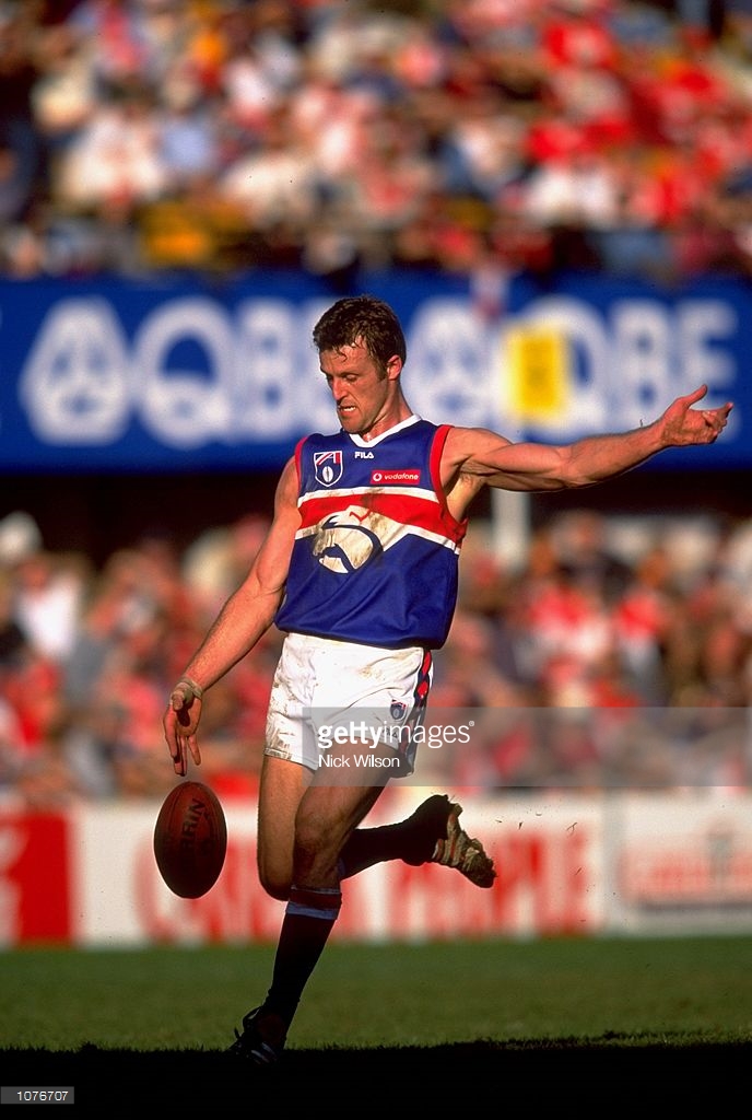 jul-1999-chris-grant-of-the-western-bulldogs-in-action-during-the-afl-picture-id1076707