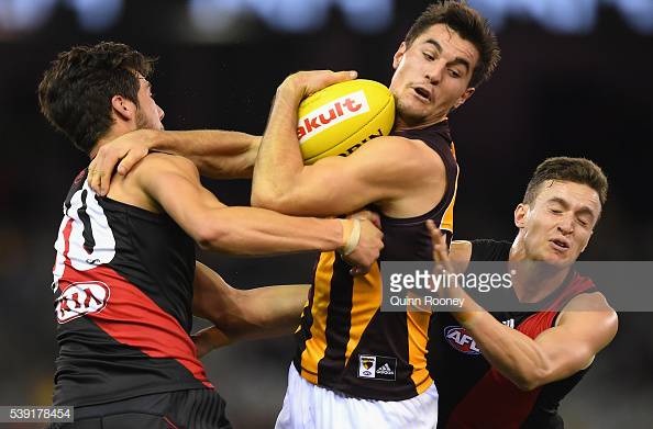 kade-stewart-of-the-hawks-is-tackled-by-kyle-langford-and-orazio-of-picture-id539178454