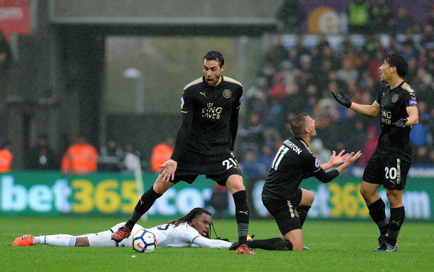 leicester-citys-vicente-iborra-marc-albrighton-and-shinji-okazaki-to-picture-id864894844