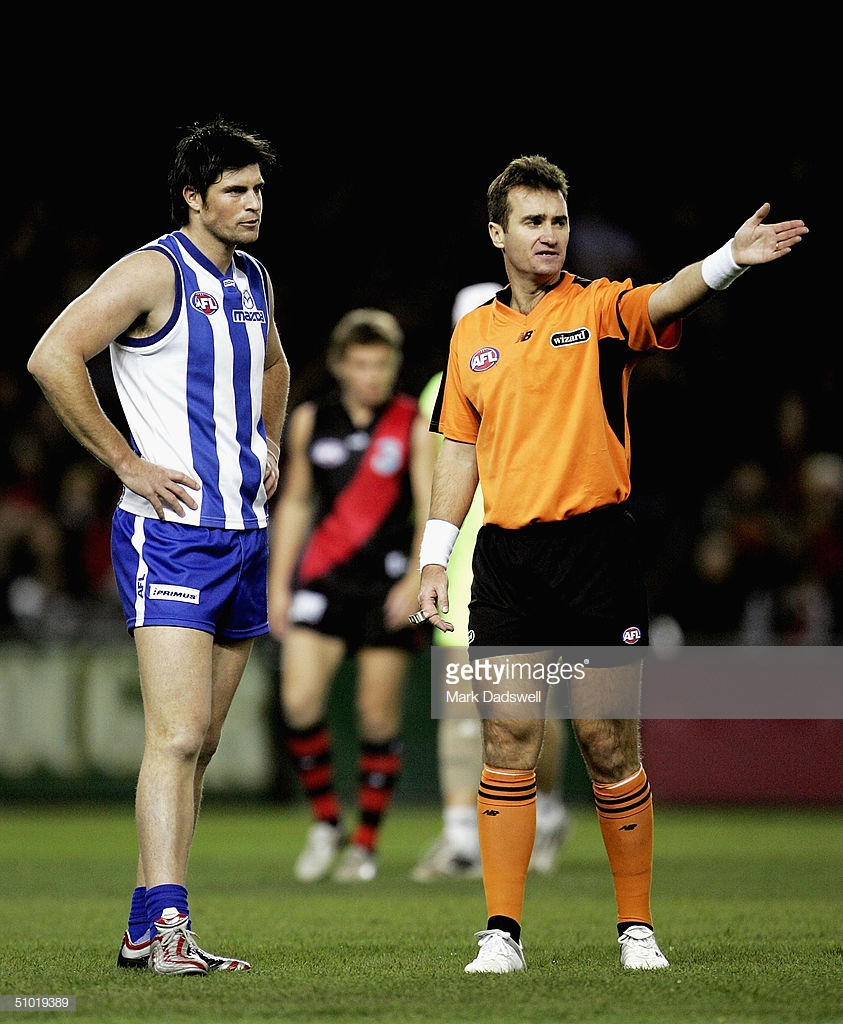 leigh-brown-for-the-kangaroos-is-penalised-by-umpire-darren-goldspink-picture-id51019389