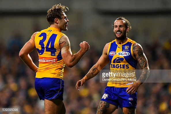 mark-hutchings-and-chris-masten-of-the-eagles-celebrates-a-goal-the-picture-id539395098