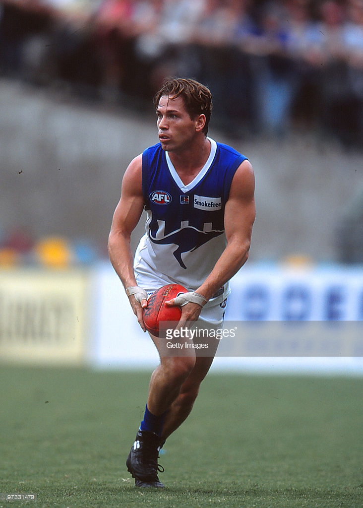 shannon-grant-of-the-kangaroos-looks-upfield-during-the-round-two-afl-picture-id97331479