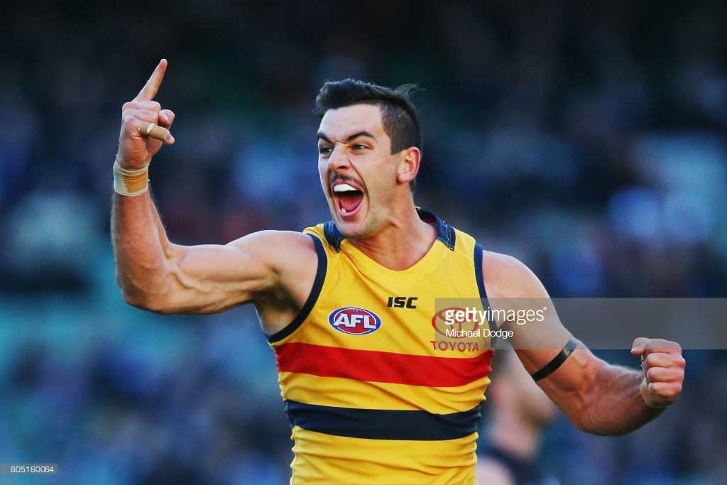 taylor-walker-of-the-crows-celebrates-a-goal-during-the-round-15-afl-picture-id805160064