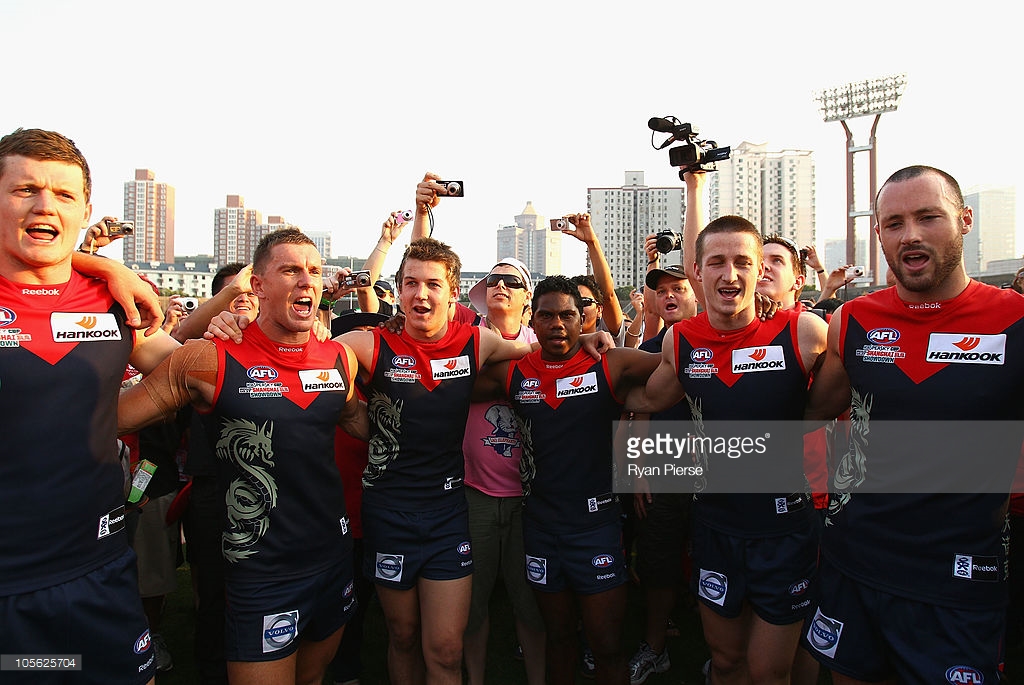the-demons-sing-the-club-song-after-the-afl-kaspersky-cup-shanghai-picture-id105625704