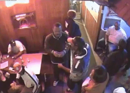 Bouncer-Jumps-Into-Action-When-The-Security-Officer-Runs-Away-From-a-Gun-Man-Walking-Into-The-Bar.gif