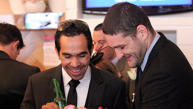 186684-eddie-betts-and-brendan-fevola.jpg