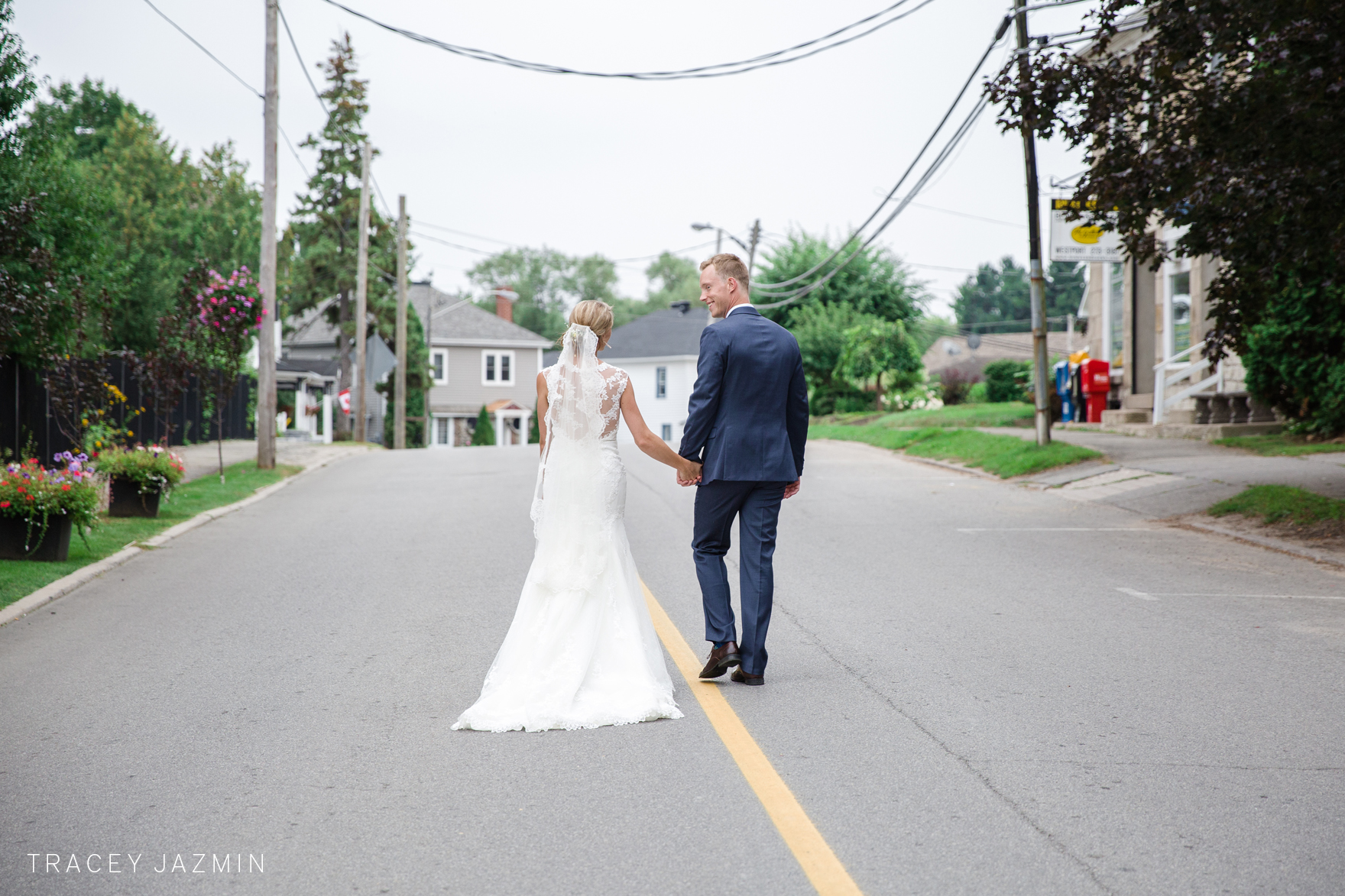 westport-ontario-wedding-couple-walking-down-middle-road-tracey-jazmin.jpg
