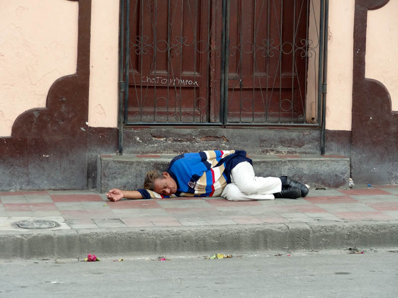 Man-Sleeping-In-The-Street.jpg