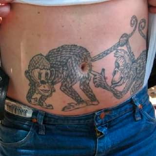 mokeys-funny-tattoo-on-belly.jpg