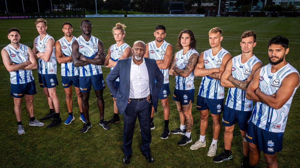 Ben Amarfio is joined by Paul Ahern, Matt McGuinness, Aiden Bonar, Majak Daw, Jed Anderson, Tarryn Thomas, Marley Williams, Kyron Hayden, Jy Simpkin and Aaron Hall as North Melbourne takes a stand against racism. Picture: Jake Nowakowski