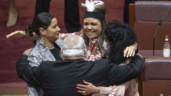 Senator Jacinta Price is congratulated by Senator Jana Stewart and other indigenous Senators, Pat Dodson and Malarndirri McCarthy after she gave a passionate maiden speech in the Senate Chamber in Parliament House in Canberra. Picture: NCA NewsWire / Gary Ramage