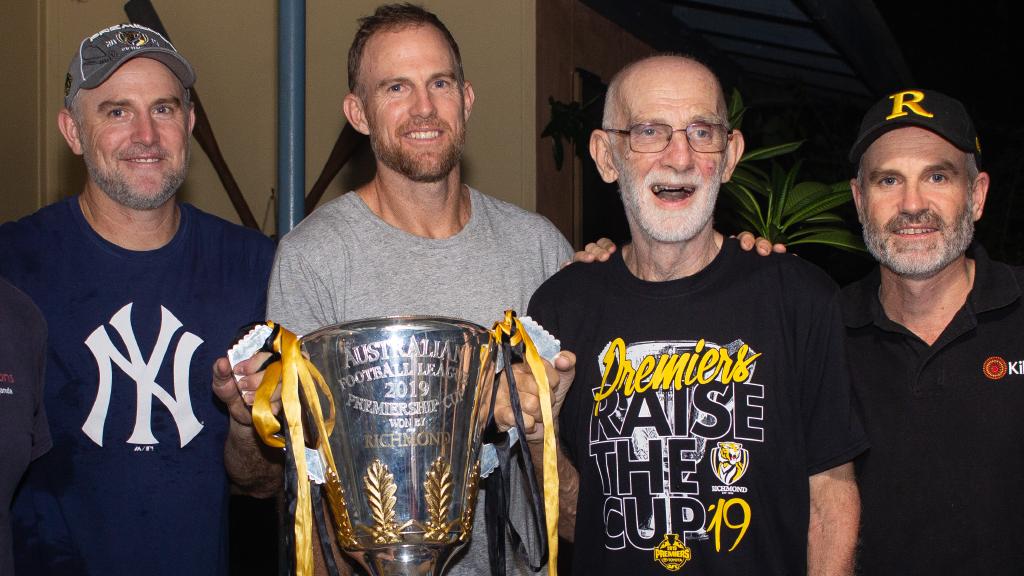 Joel Bowden, Patrick Bowden and Michael Bowden with the premiership cup. Picture: Richmond FC