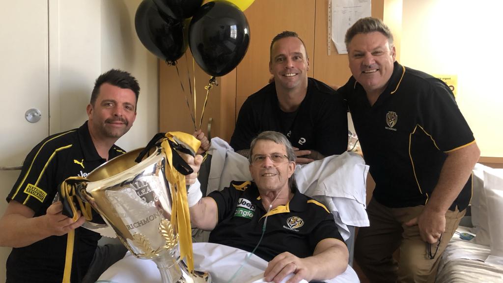 Ben Jenkins, Brian Donaldson, Jake King and Craig Smithers with the premiership cup. Picture: Richmond FC