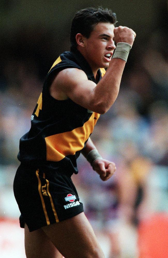 Andrew Mills celebrates his first goal during his debut against the Dockers.