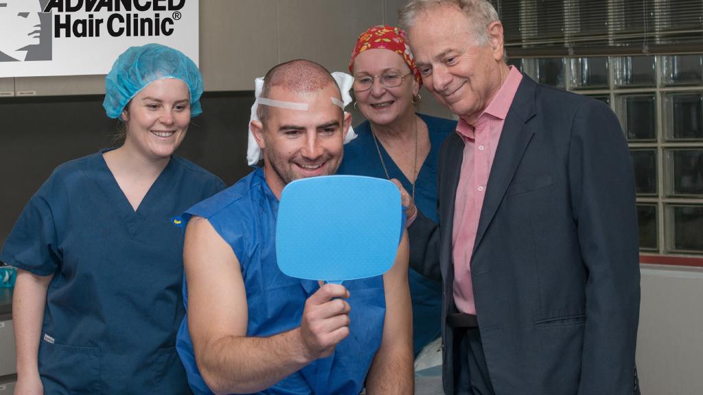 Ben Cunnington and the team at Advanced Hair Studio as he undergoes treatment to replace his thinning locks. Picture: Advanced Hair/Supplied