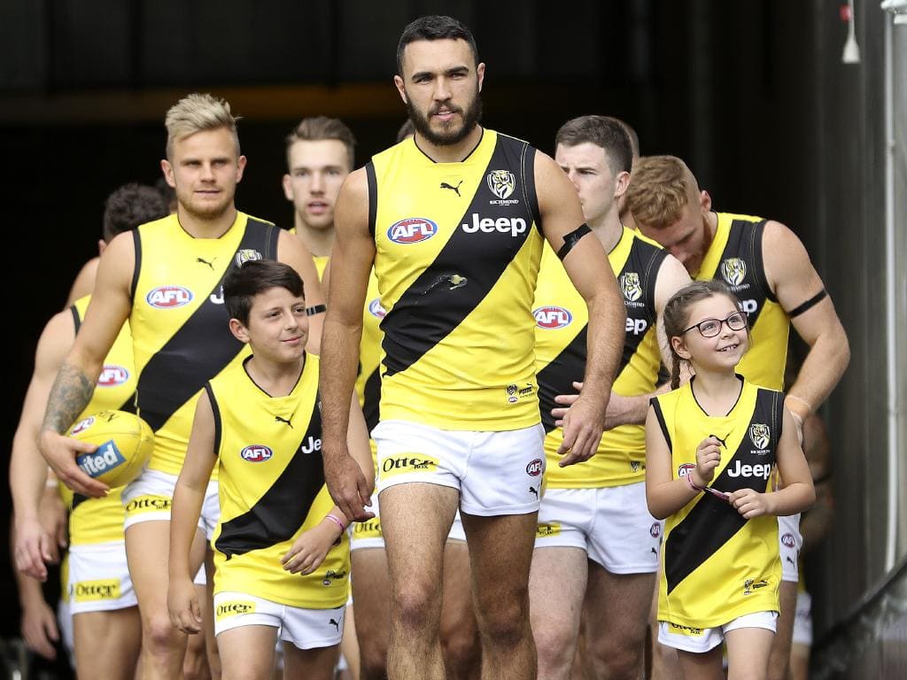 Shane Edwards leads the Tigers out as stand-in skipper against Port Adelaide. Picture Sarah Reed