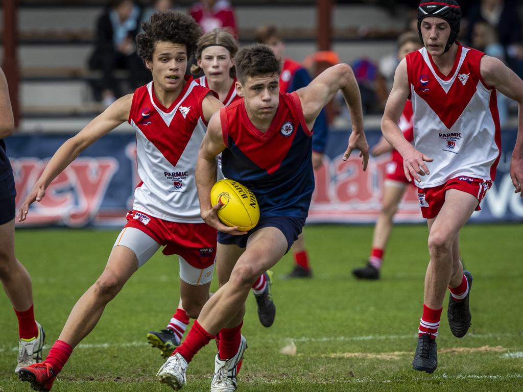 The number of players in junior Aussie Rules competitions in Tasmania has been falling in recent years. Picture: LUKE BOWDEN
