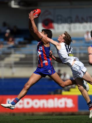 Jamarra Ugle-Hagan and Joseph Lloyd in the NAB Preliminary Final between Oakleigh and Sandringham last year. Picture: Andy Brownbill