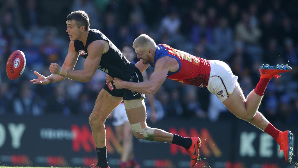 Nick Robertson tackles Carlton’s Patrick Cripps in the Round 12 clash at Marvel Stadium. Picture: Michael Klein