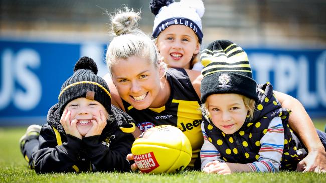 Richmond AFLW captain Katie Brennan with fans Lachie Galbraith, Cleo Magauire and Luca Pandolfini. Picture: Nicole Cleary