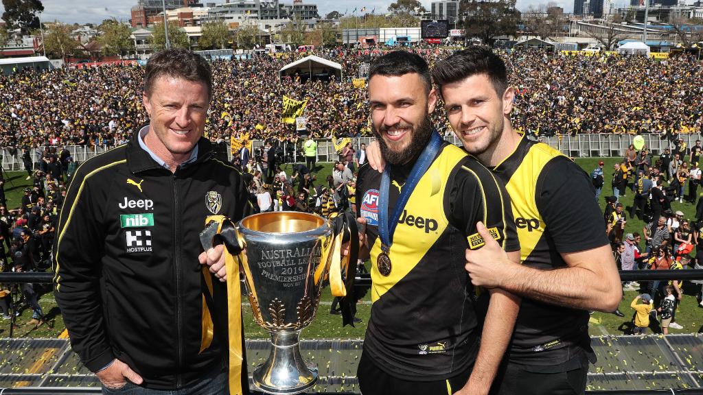 Coach Damien Hardwick, Shane Edwards and captain Trent Cotchin with the 2019 premiership cup. Picture: Michael Klein.