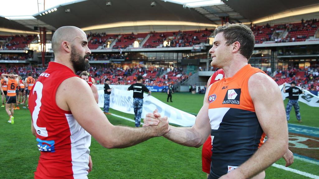 Brothers Rhyce and Heath Shaw shake hands before a Sydney derby.