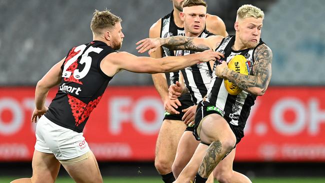 Collingwood’s Jordan De Goey, right, was charged with sexual assault by Victorian Police on Saturday Picture: Getty Images