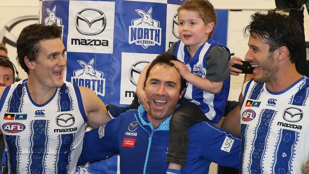 Scott celebrates a win in his last game as coach of the Roos. Picture: Michael Klein