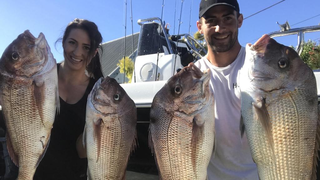Ben Cunnington and wife Belinda show off their fishing haul.