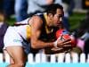 ADELAIDE, AUSTRALIA - JULY 27: Eddie Betts intercpts andkicks a goal behind Michael Virgin of the Tigers  during the round 14 SANFL match between the Glenelg Tigers and the Adelaide Crows at ACH Group Stadium on July 27, 2019 in Adelaide, Australia. (Photo by Mark Brake/Getty Images)