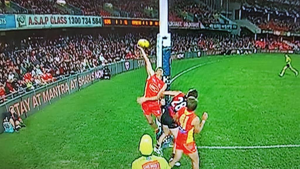 Zaharakis’ shot for goal was clearly over and the goal umpire was in perfect position, but did not make a decision.