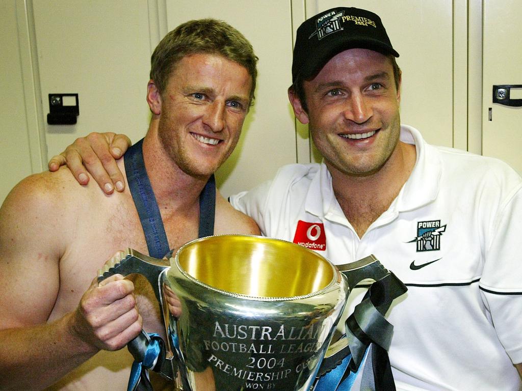 Hardwick pictured with [PLAYERCARD]Matthew Primus[/PLAYERCARD] after winning the premiership with Port Adelaide in 2004.