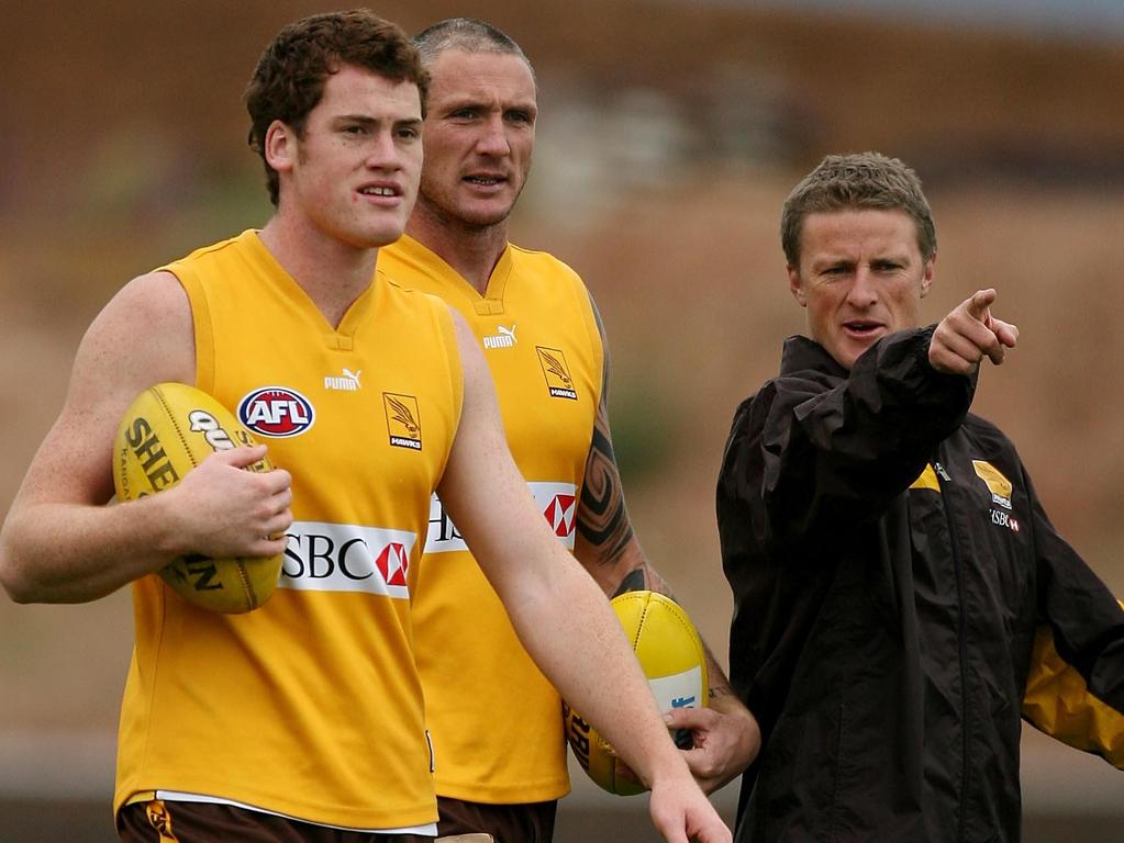 [PLAYERCARD]Jarryd Roughead[/PLAYERCARD] and Peter Everitt get directions from Hardwick at Hawthorn training during his time as an assistant coach.