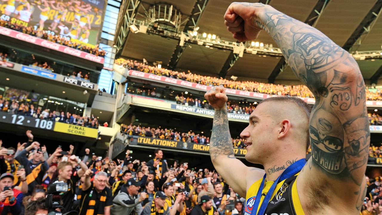 Dustin Martin celebrates the 2017 flag with the Tiger Army. Picture: Mark Stewart