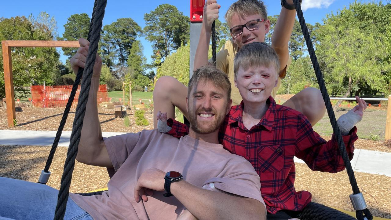 Dyson Heppell hangs out with Harrison and Miller Pennicott at Ringwood North's McAlpin Reserve. Picture: Kiel Egging.