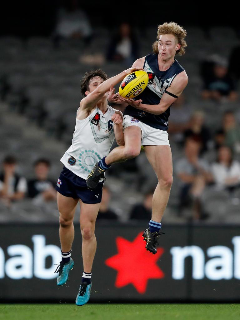 Bailey Macdonald flies to take a mark against Vic Country. Picture: Dylan Burns/AFL Photos via Getty Images