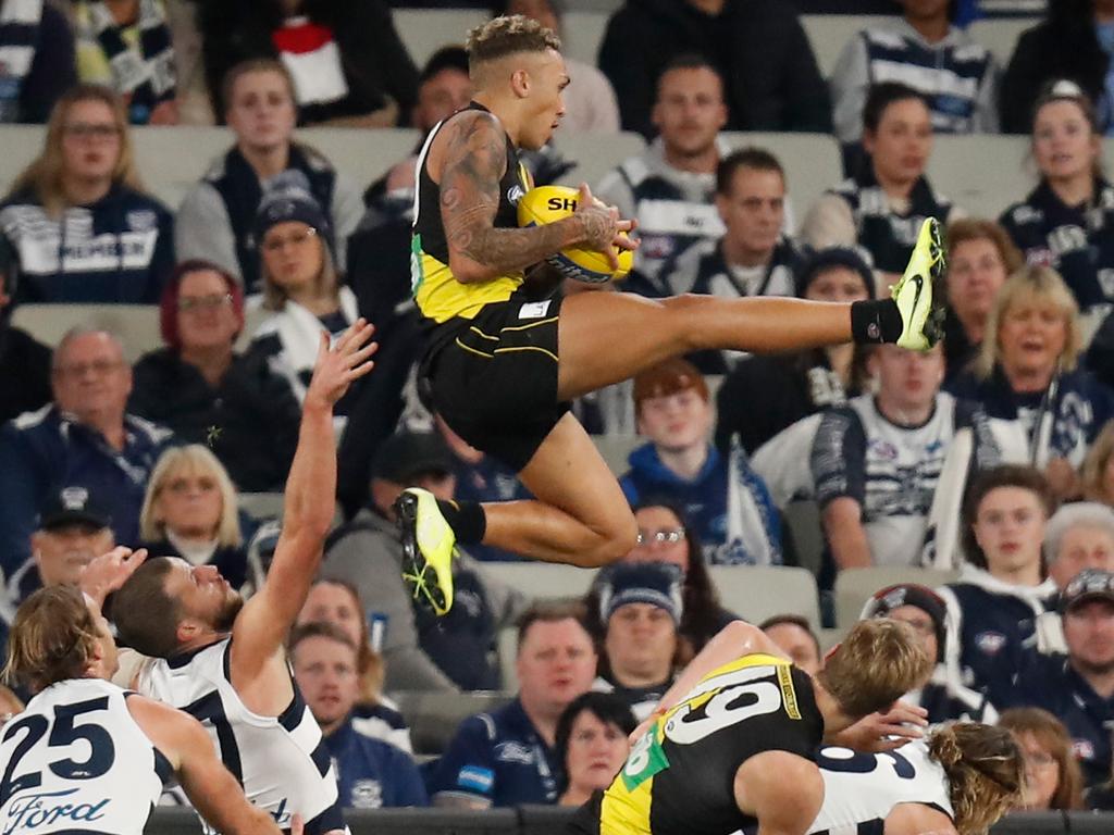 [PLAYERCARD]Shai Bolton[/PLAYERCARD] launches into the night sky. Picture: Michael Willson/AFL Photos via Getty Images