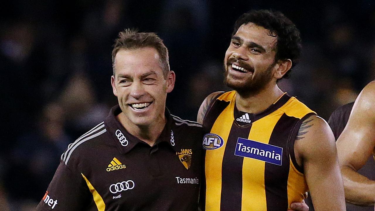 Cyril Rioli and Alastair Clarkson. Picture: Colleen Petch.