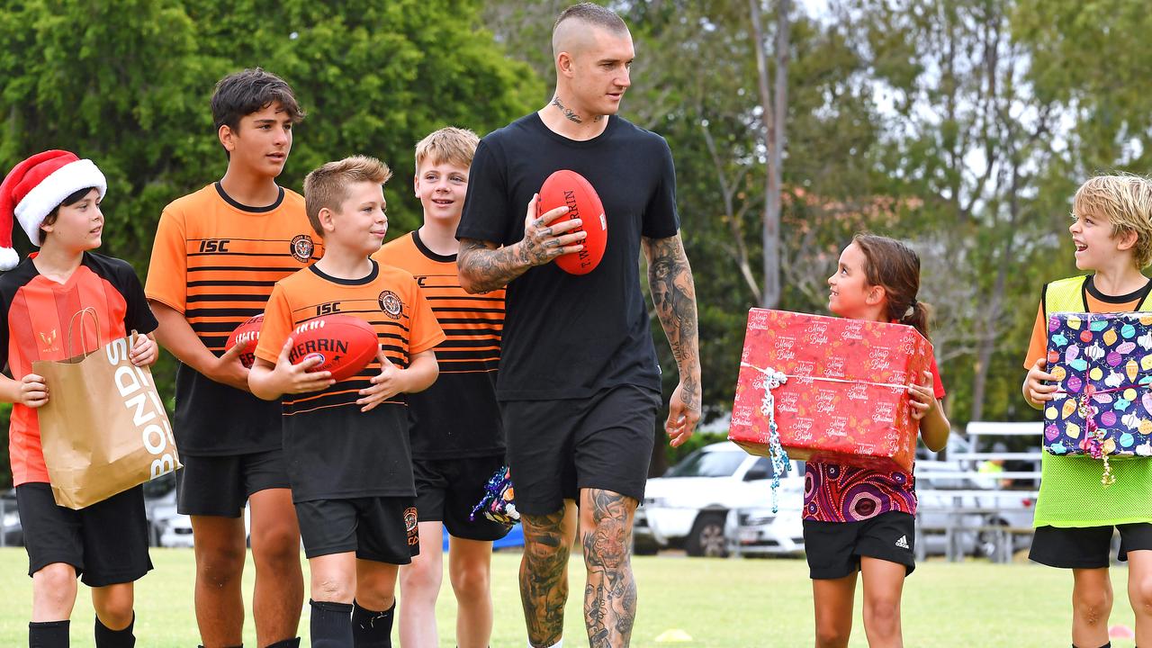 Martin was handing out gifts as part of Bonds’ Christmas initiative with Givit. Picture, John Gass