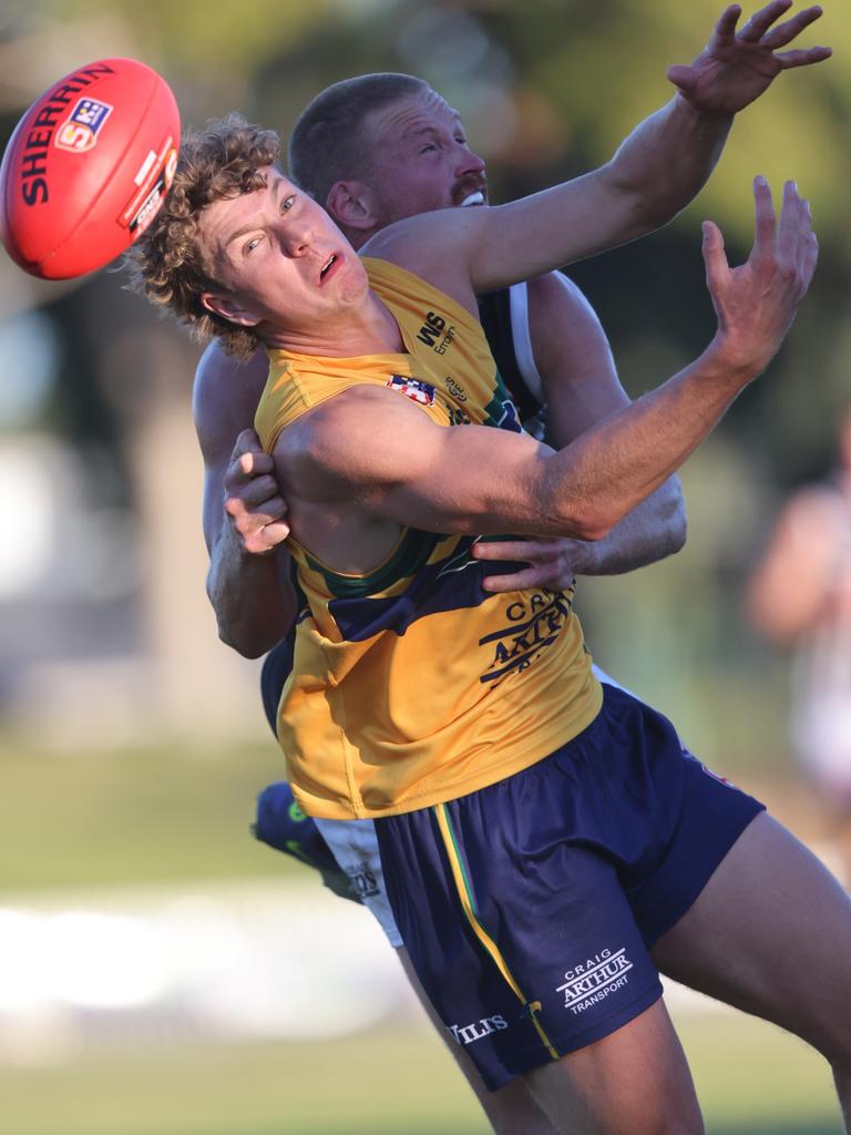 Eagle Patrick Weckert attempts a mark opposed to Port Adelaide’s [PLAYERCARD]Tom Clurey[/PLAYERCARD] in the SANFL game at Woodville Oval on Sunday. Picture: Cory Sutton/SANFL