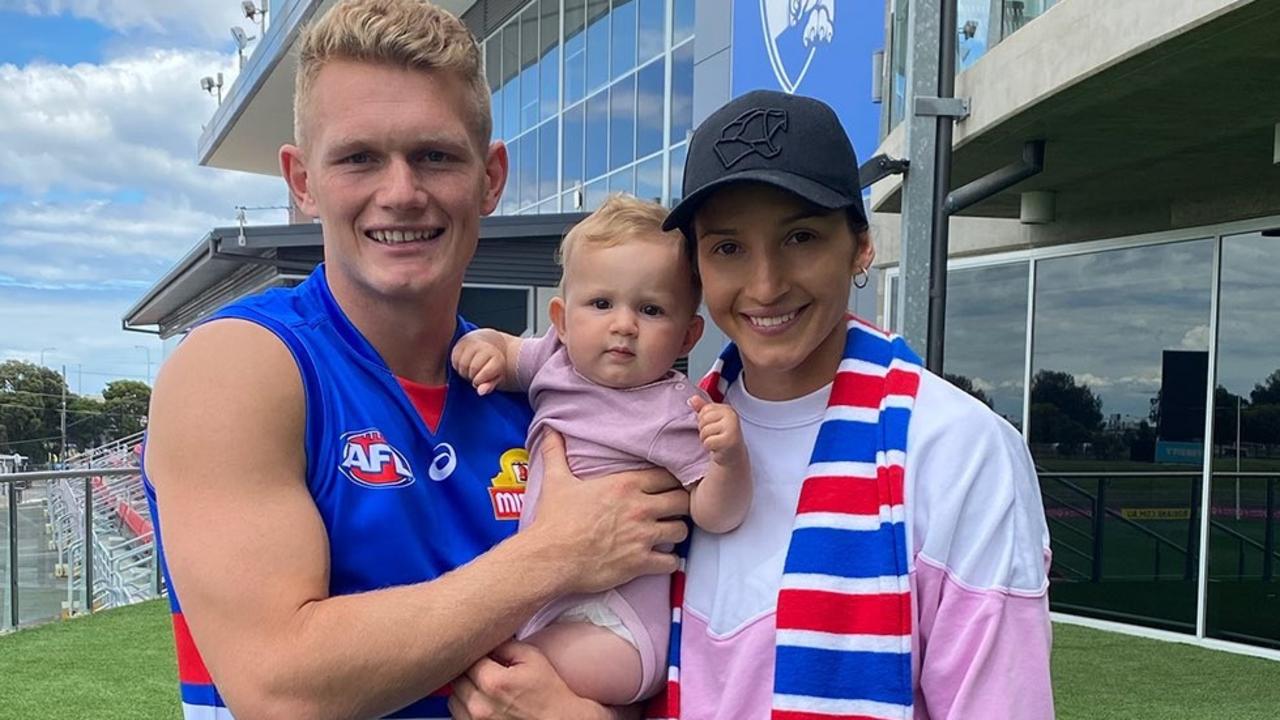 Treloar and wife Kim Ravallion and daughter Georgie at the home of the Western Bulldogs