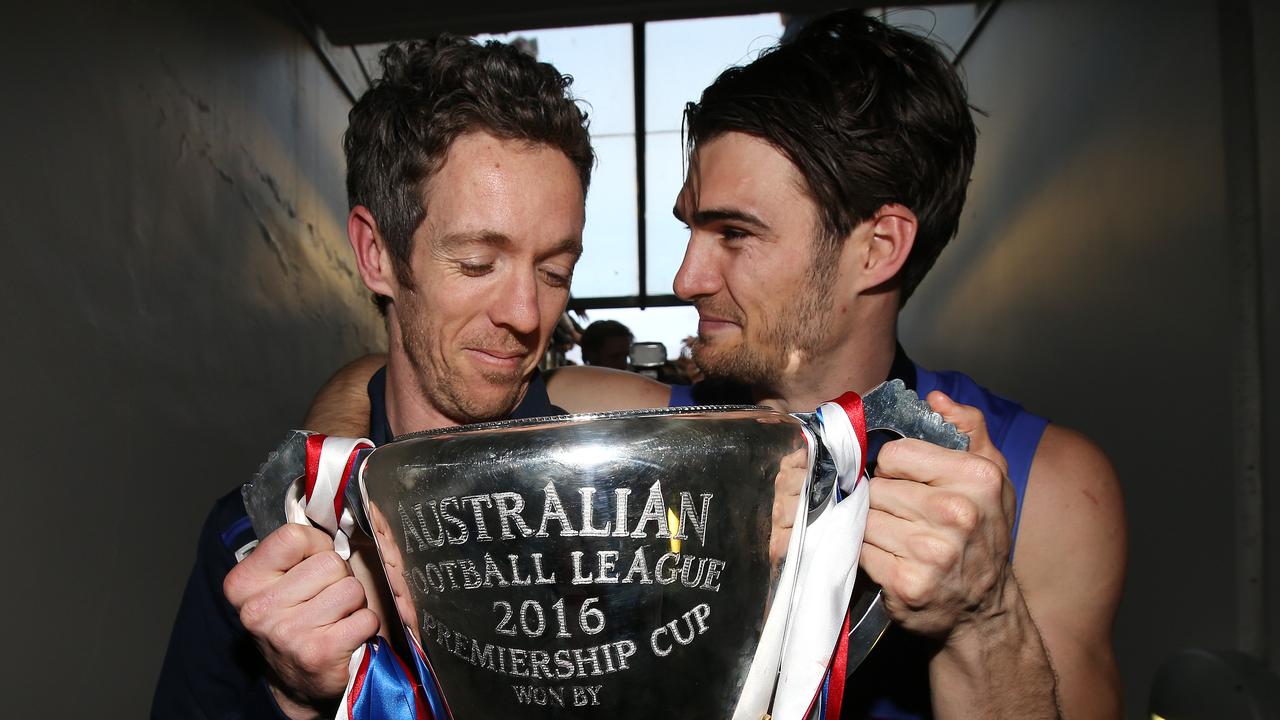 Bob Murphy and [PLAYERCARD]Easton Wood[/PLAYERCARD] after the Bulldogs’ 2016 premiership. Picture: Michel Klein