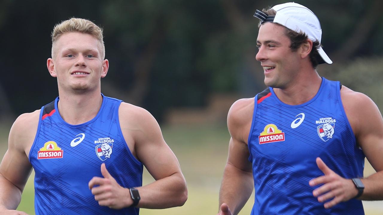[PLAYERCARD]Adam Treloar[/PLAYERCARD] and [PLAYERCARD]Josh Dunkley[/PLAYERCARD] run laps at Whitten Oval.
