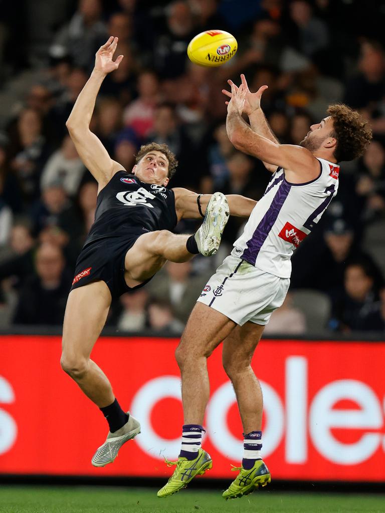 Logue enjoyed the challenge of playing on some of the AFL’s best forwards, like Carlton’s Charlie Curnow. Picture: Michael Willson/AFL Photos via Getty Images