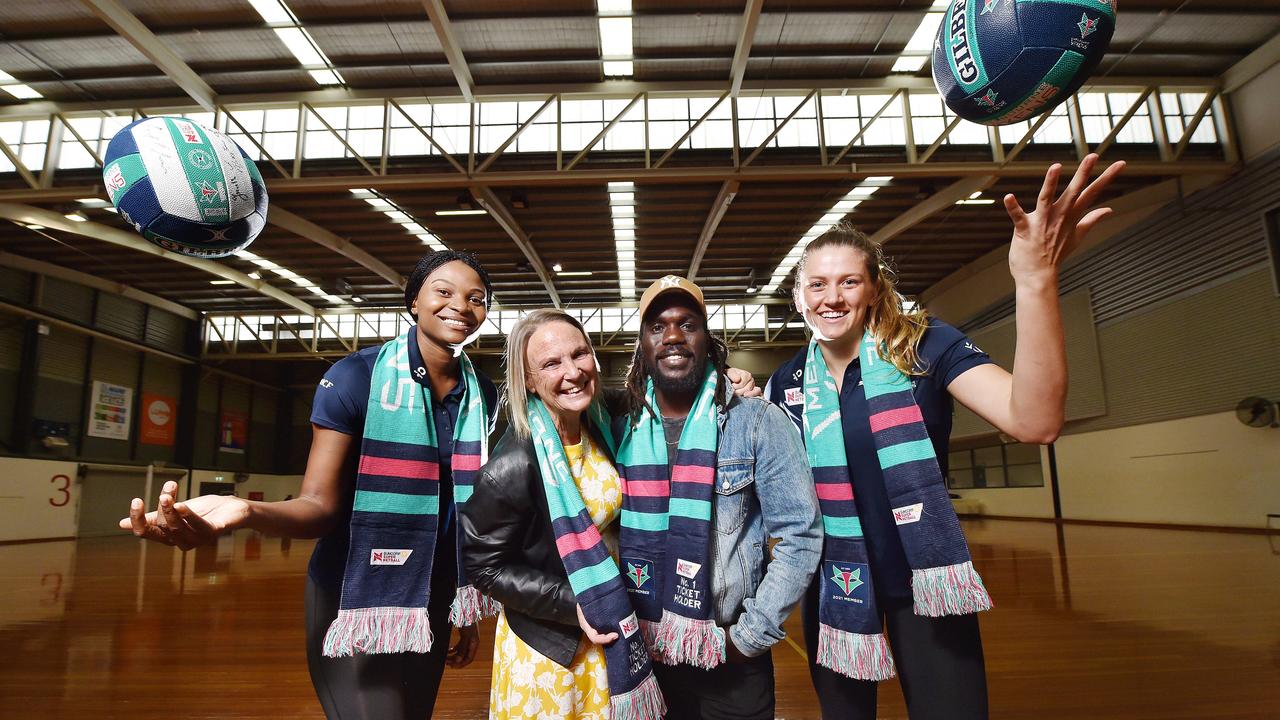 McDonald-Tipungwuti and his mum Jane are the No.1 ticketholders for the Melbourne Vixens. They’re pictured with Mwai Kumwenda and Kate Eddy. Picture: Nicki Connolly