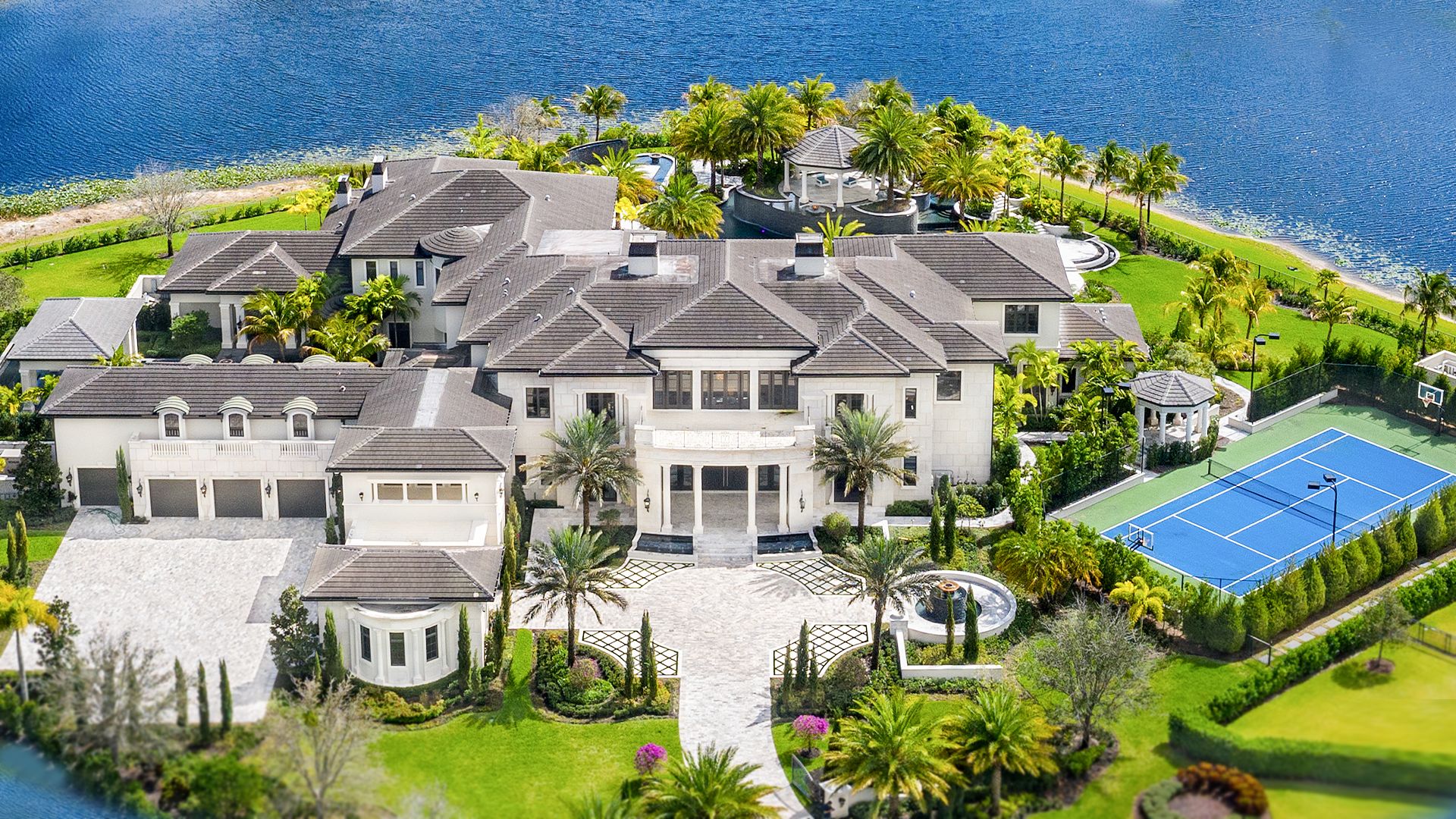 architecturaldigest_on-the-market-inside-a-23-dollars-million-mega-mansion-surrounded-by-a-lake.jpg