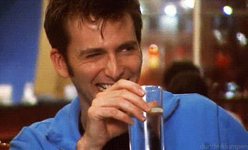 laughing drink in hand | David tennant, Giphy, David