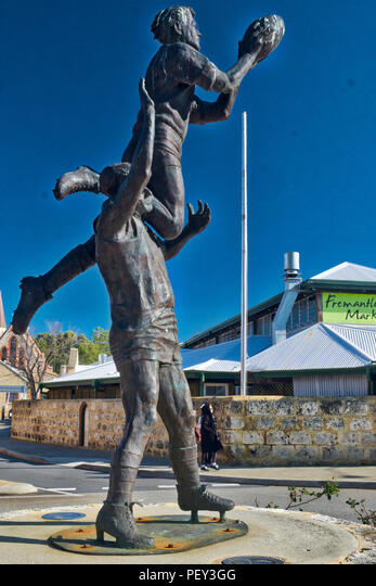 Statue of Famous Australian Rules Football Action Stock Photo